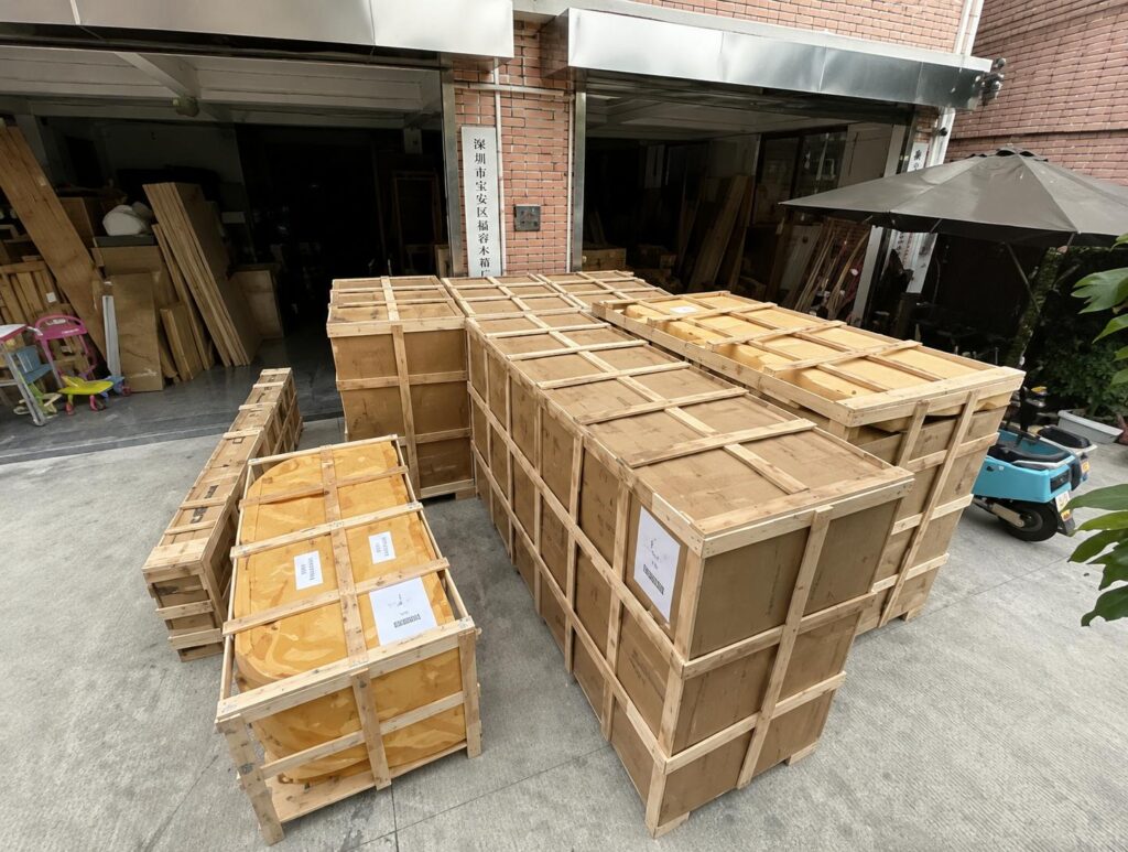 Furniture shipment packed in wooden crates before export from Shenzhen to Switzerland.