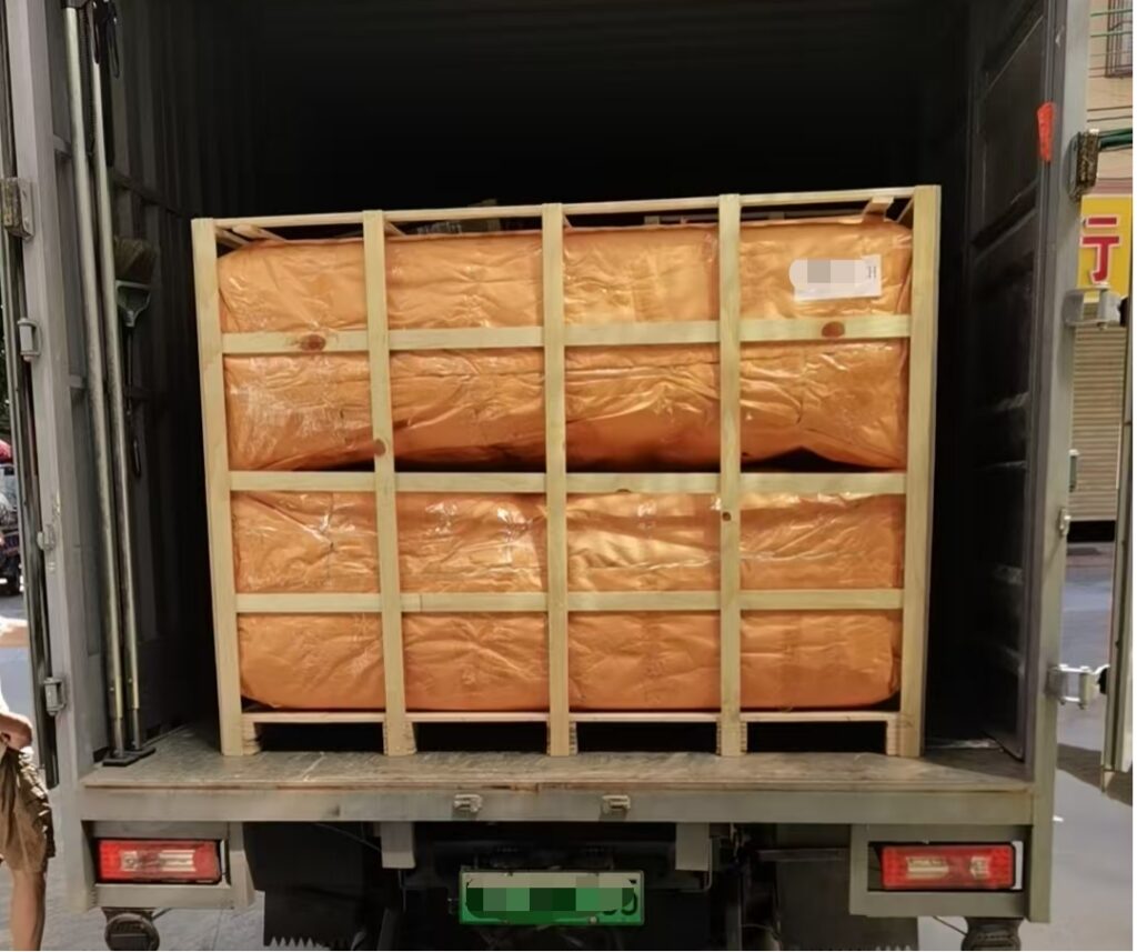 Large sofa packed in a wooden crate for sea freight shipping from Shenzhen to Switzerland.